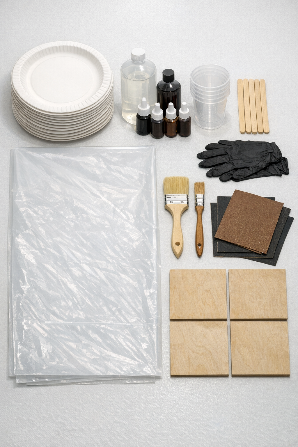 All materials laid out for faux-wood resin patio tiles