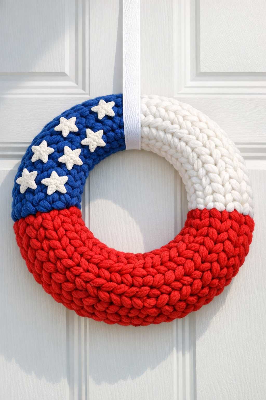 Finished patriotic crochet pool noodle door wreath