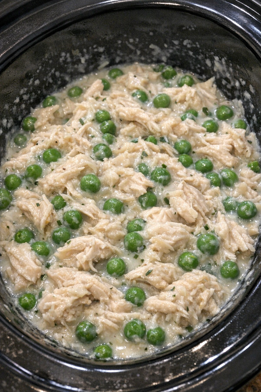 Slow cooker chicken and peas in creamy sauce