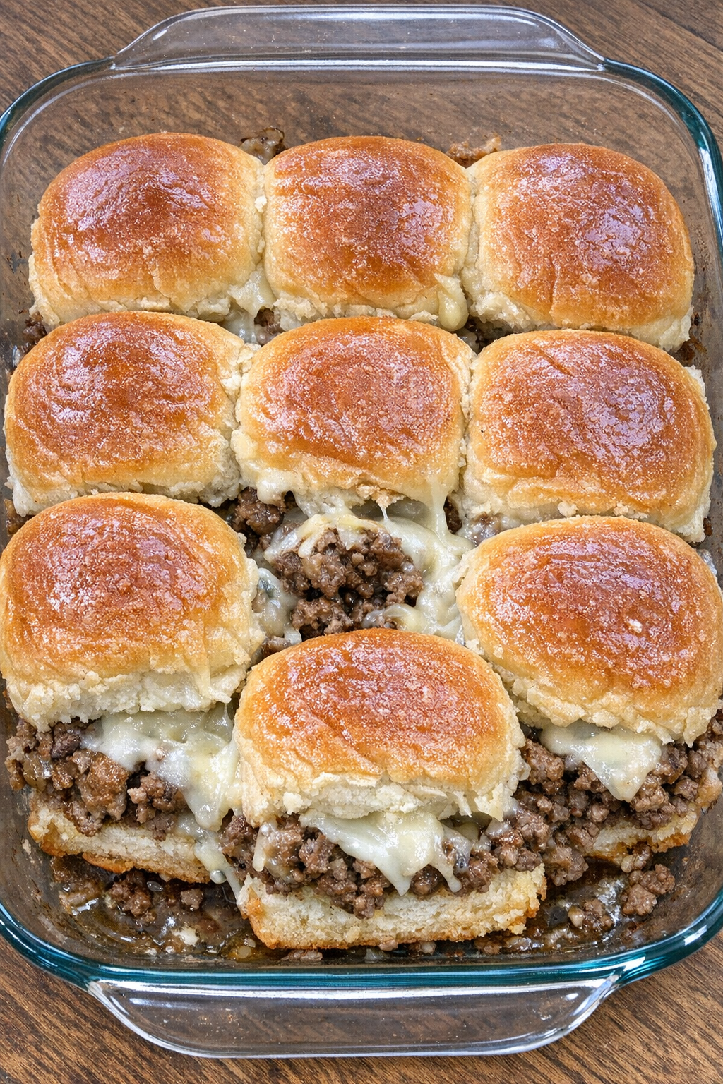 Close up of baked beef sweet roll sliders