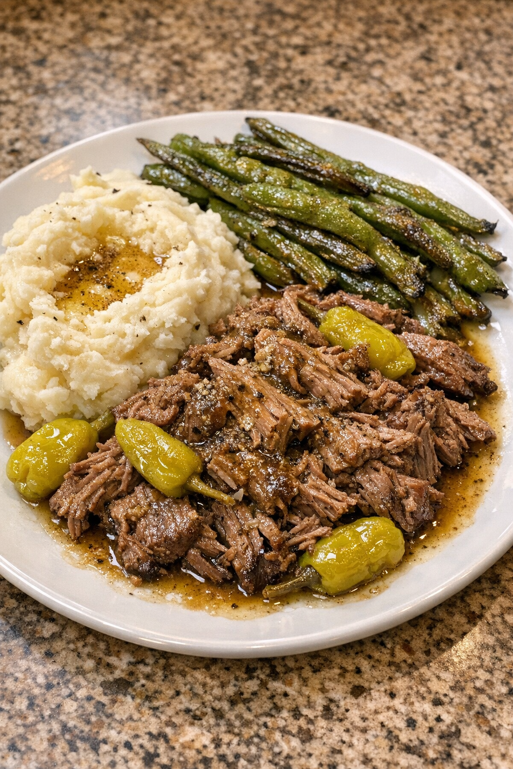 Finished Amish ranch beef plated with juices and sides