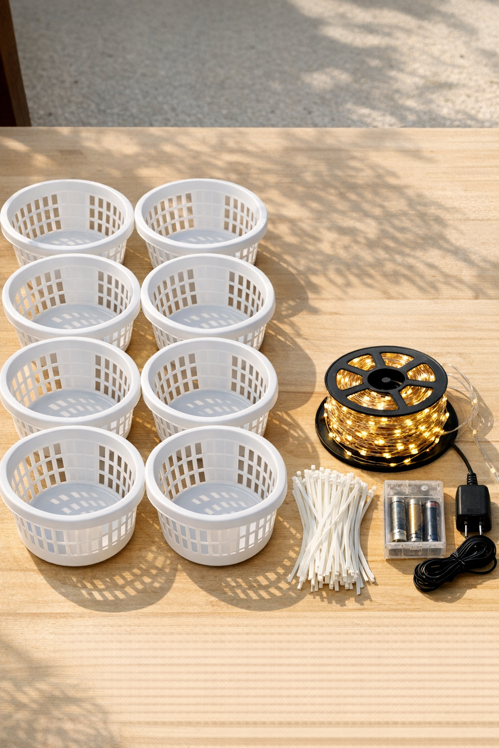 Materials for giant porch lanterns laid out on a table