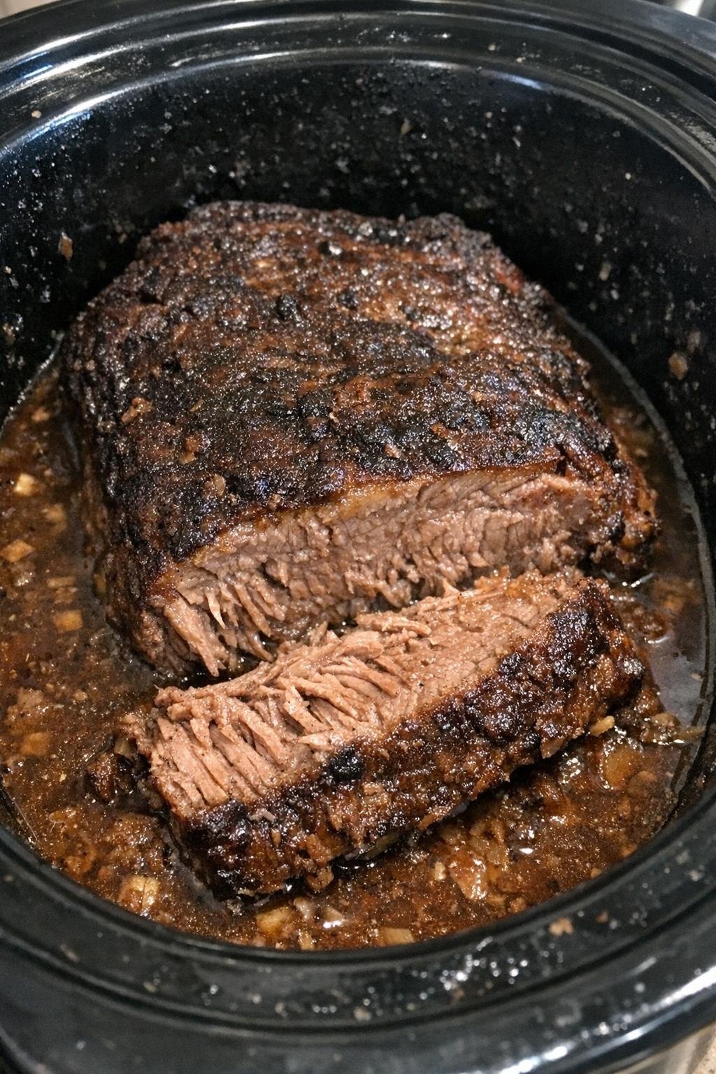 Tender beef brisket in a slow cooker