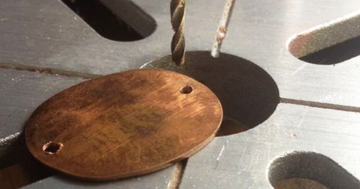 Lady presses pennies on railroad tracks and turns them into the