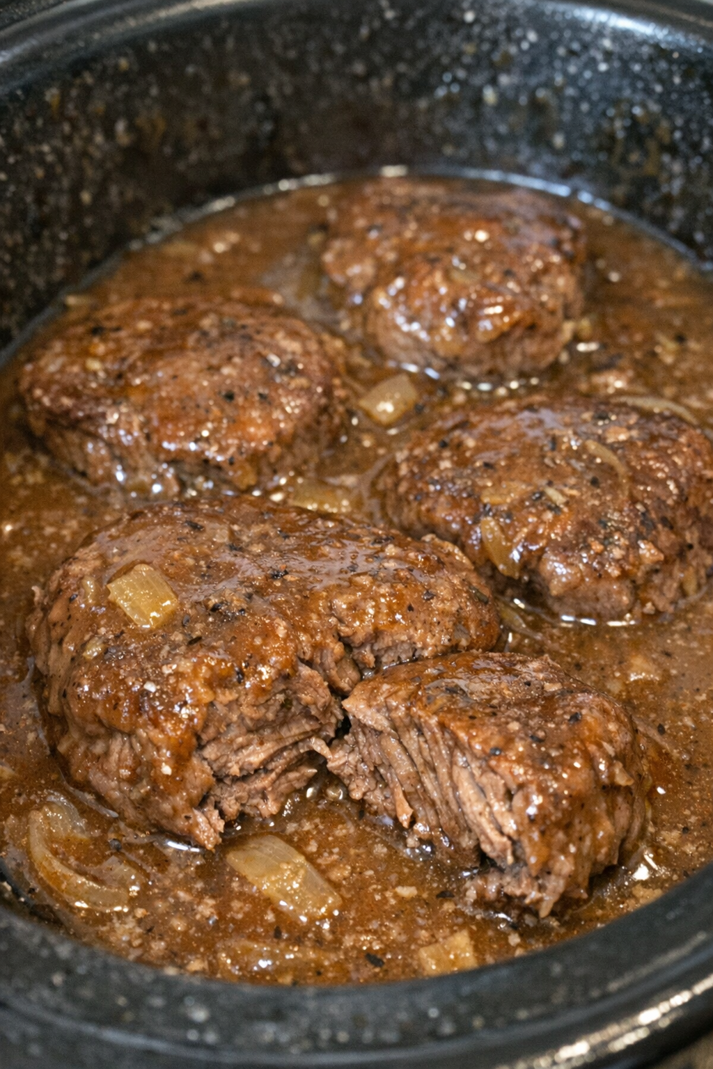 Succulent protein medallions in rich gravy in a slow cooker