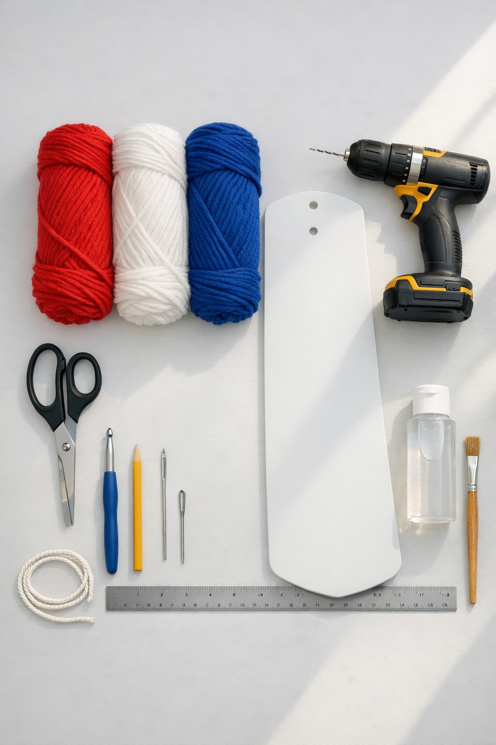 Materials for a crochet patriotic wind spinner laid out neatly