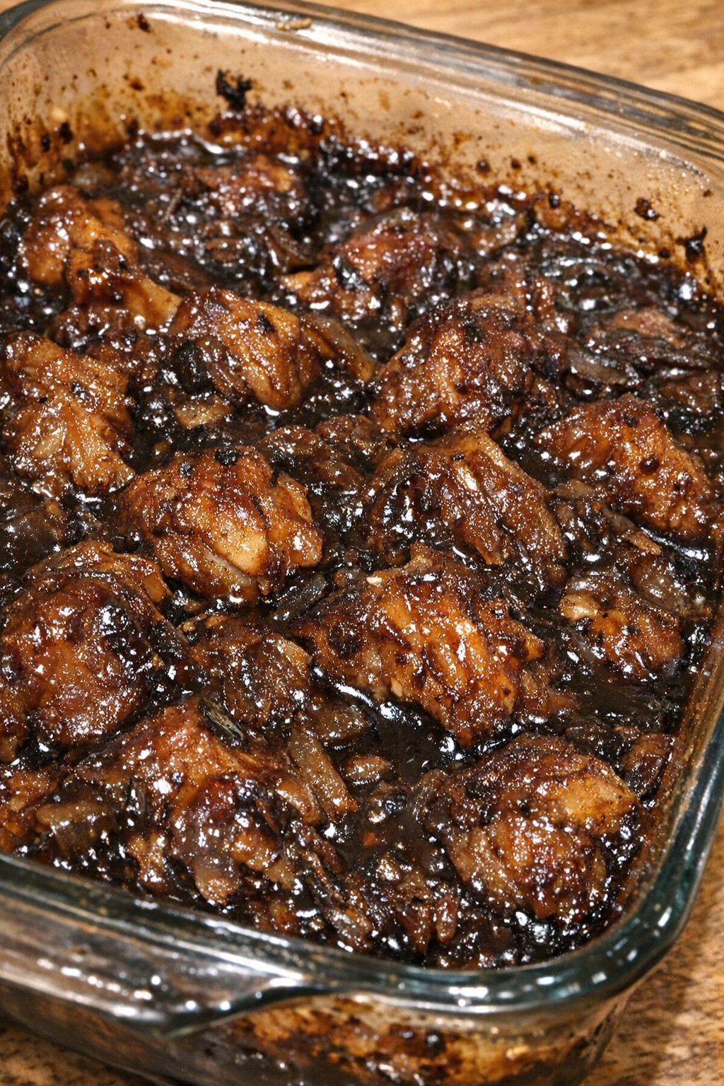Caramelized glazed casserole in a glass baking dish
