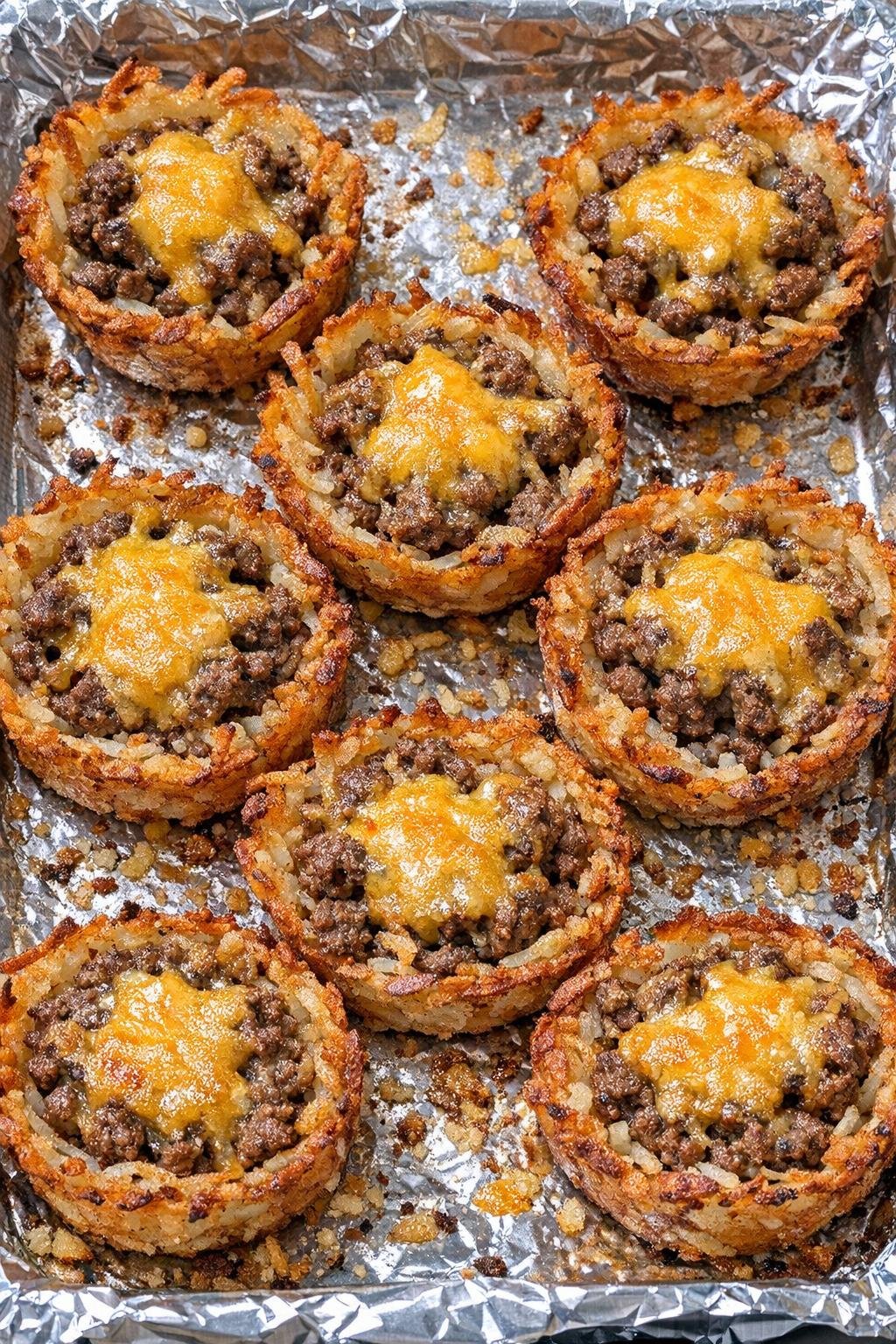 Finished beef hash brown cups with melted cheddar