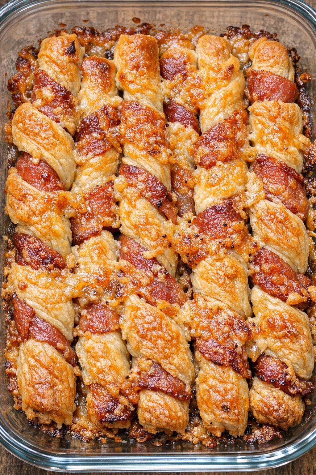 Southern 3-ingredient cheesy bacon straws baked until golden in a glass casserole dish