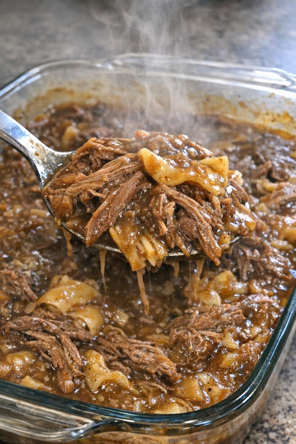 Savory beef bake in a glass casserole dish