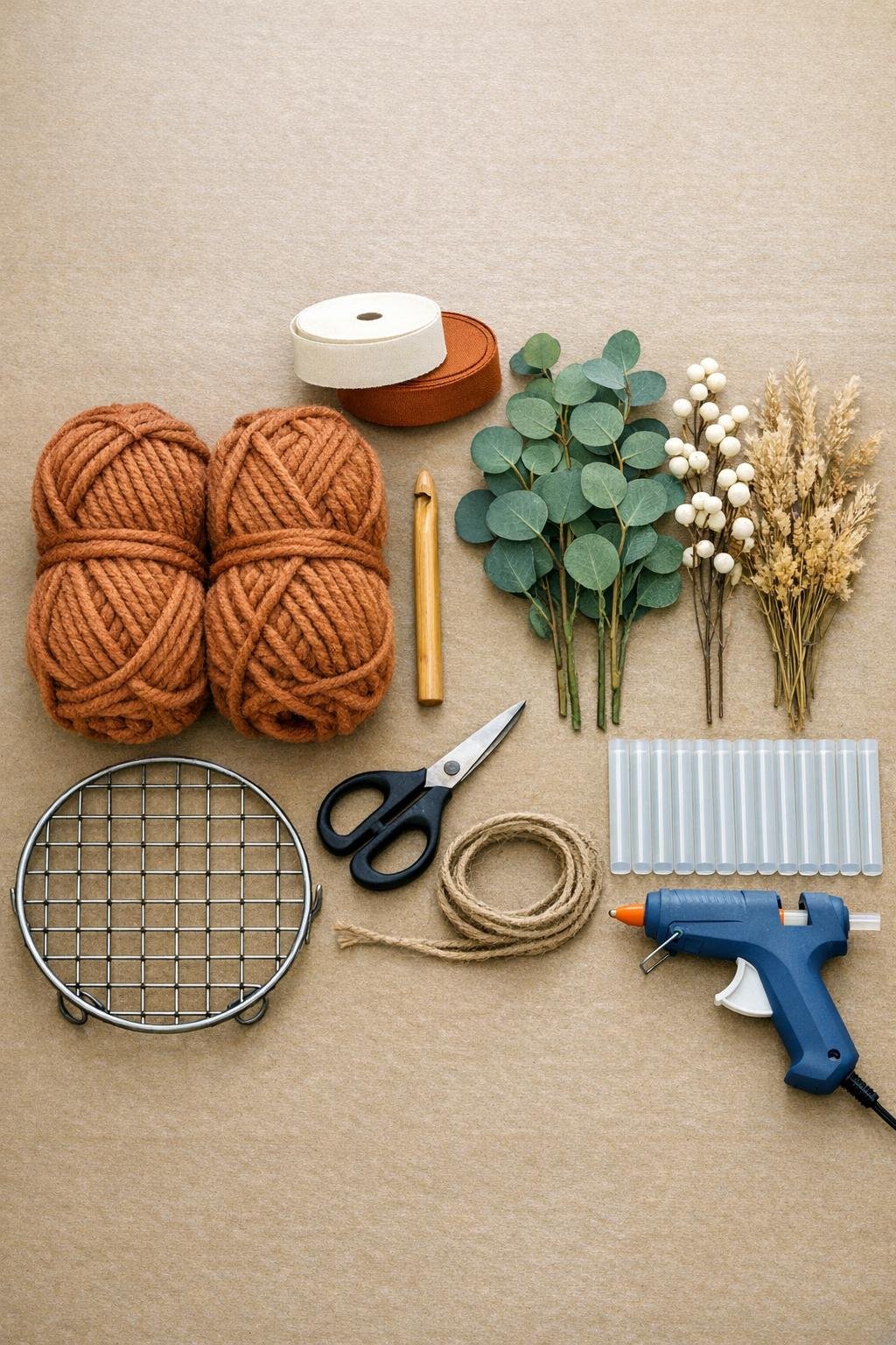 Materials for making a crochet trivet wreath laid out on a table