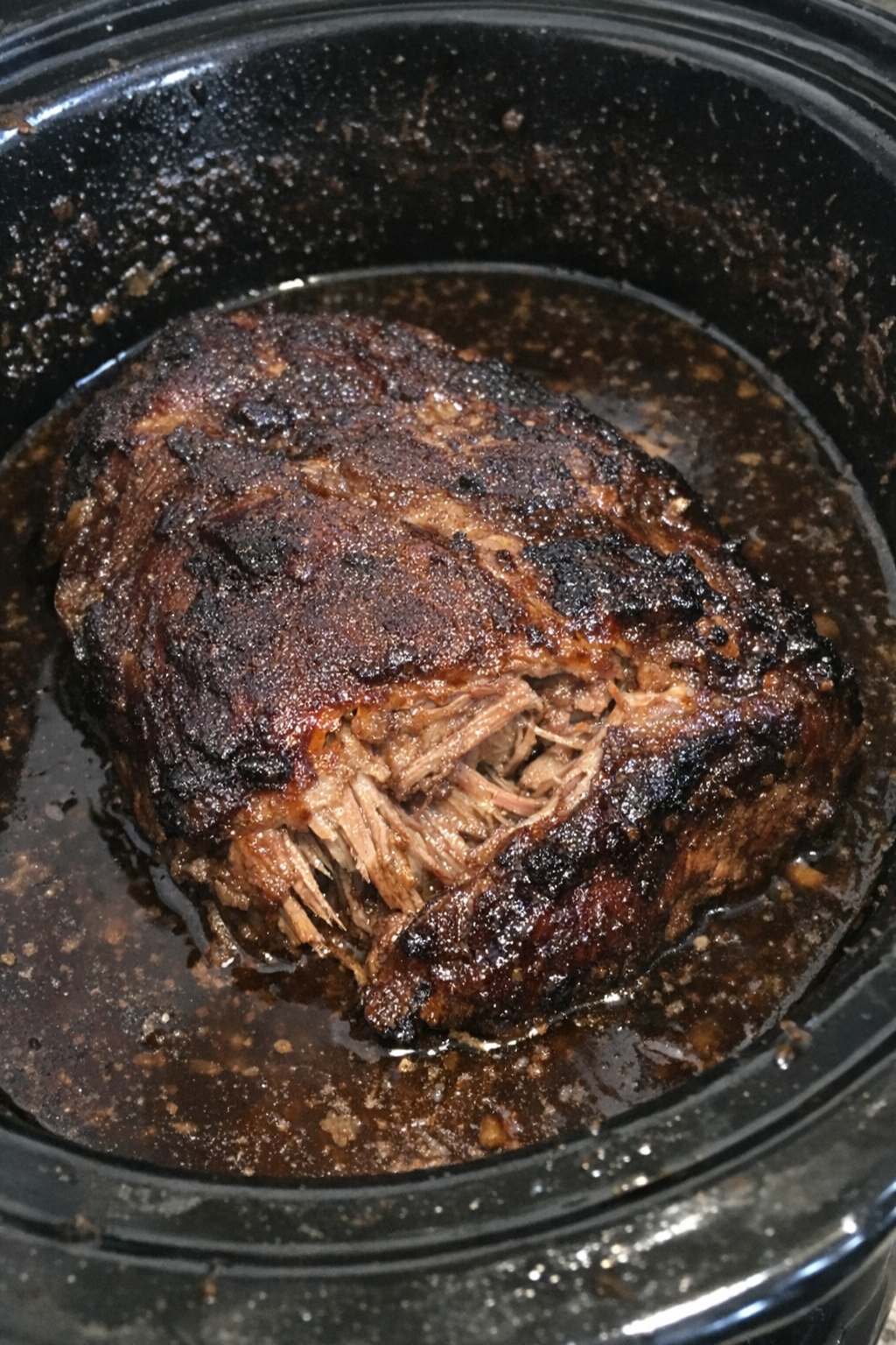 Slow cooker pork brisket in dark sauce