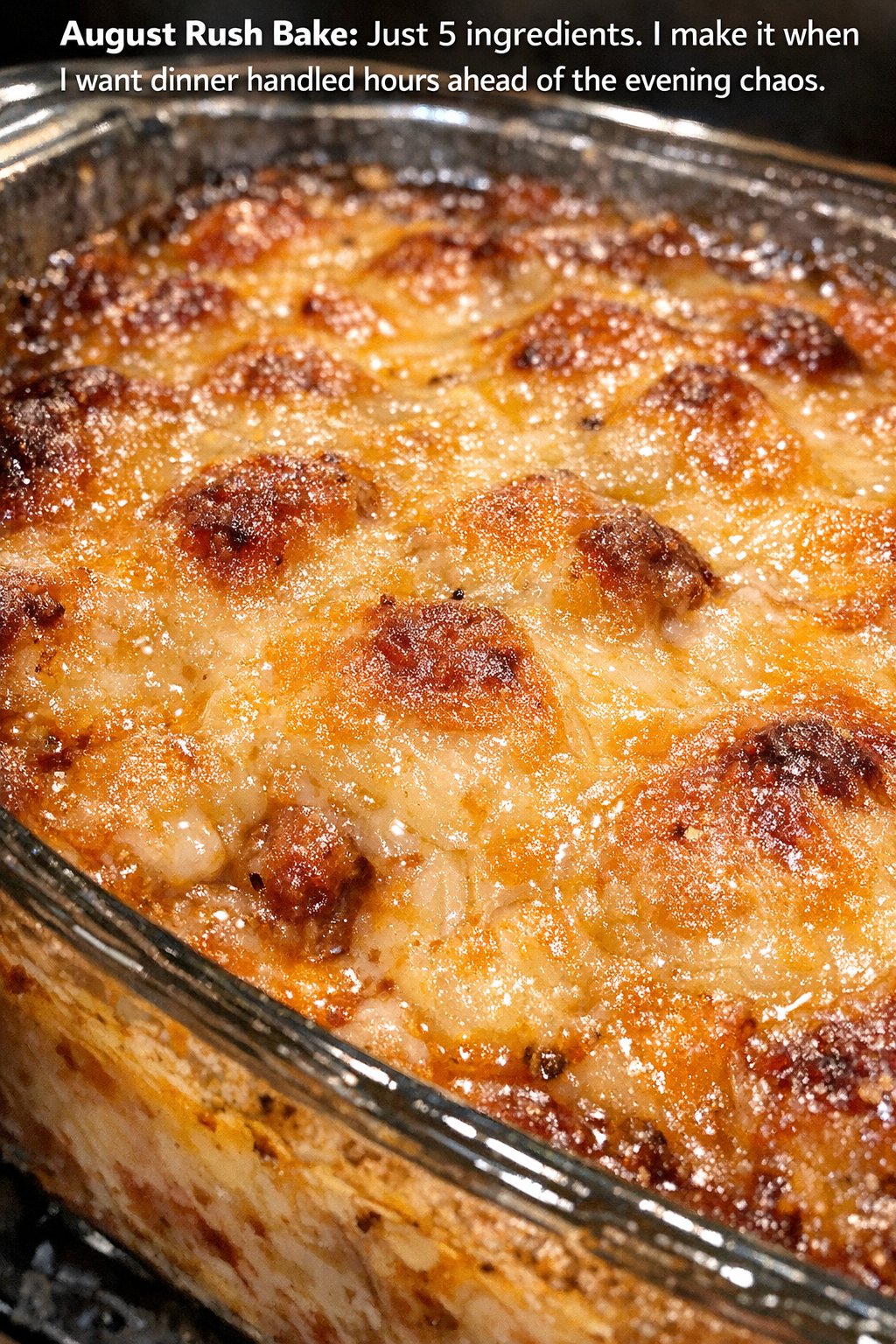 Bubbling glossy casserole in a glass baking dish
