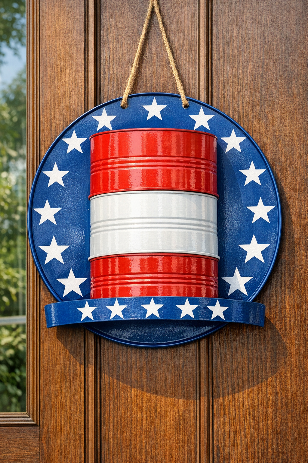Finished patriotic Uncle Sam hat front door hanger made from coffee cans on a blue serving tray