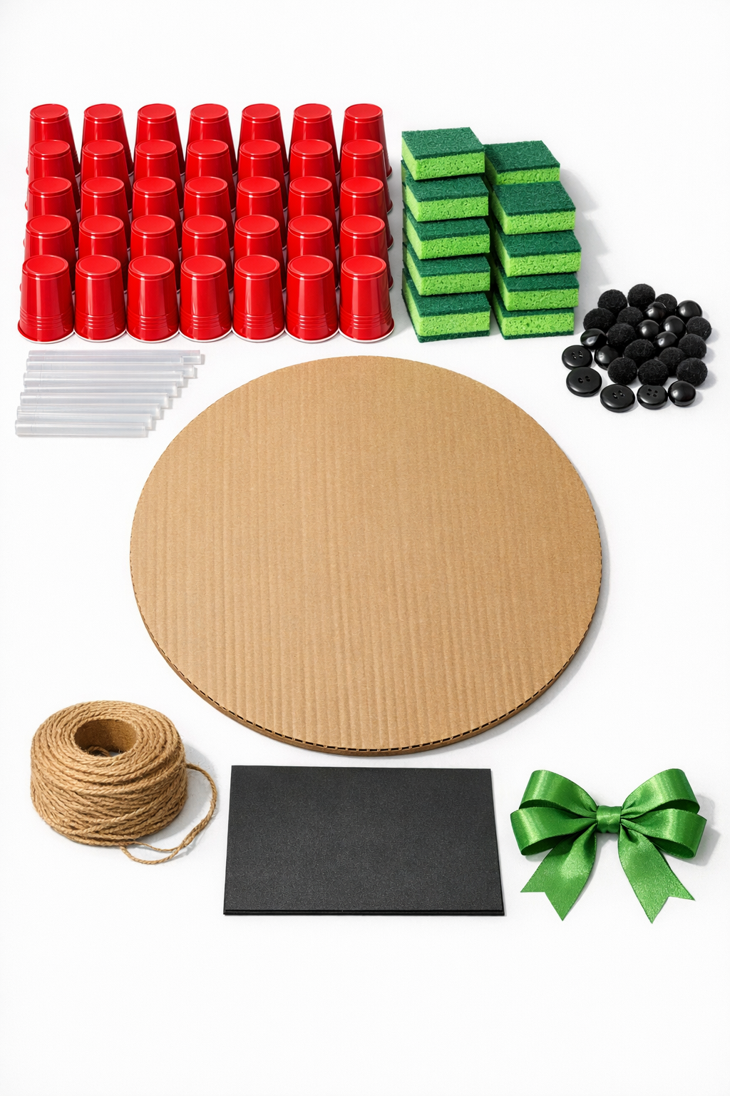 All materials for the watermelon door hanger laid out on a table
