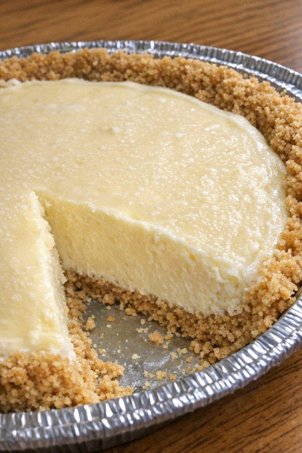 Frozen lemonade pie in foil pie pan
