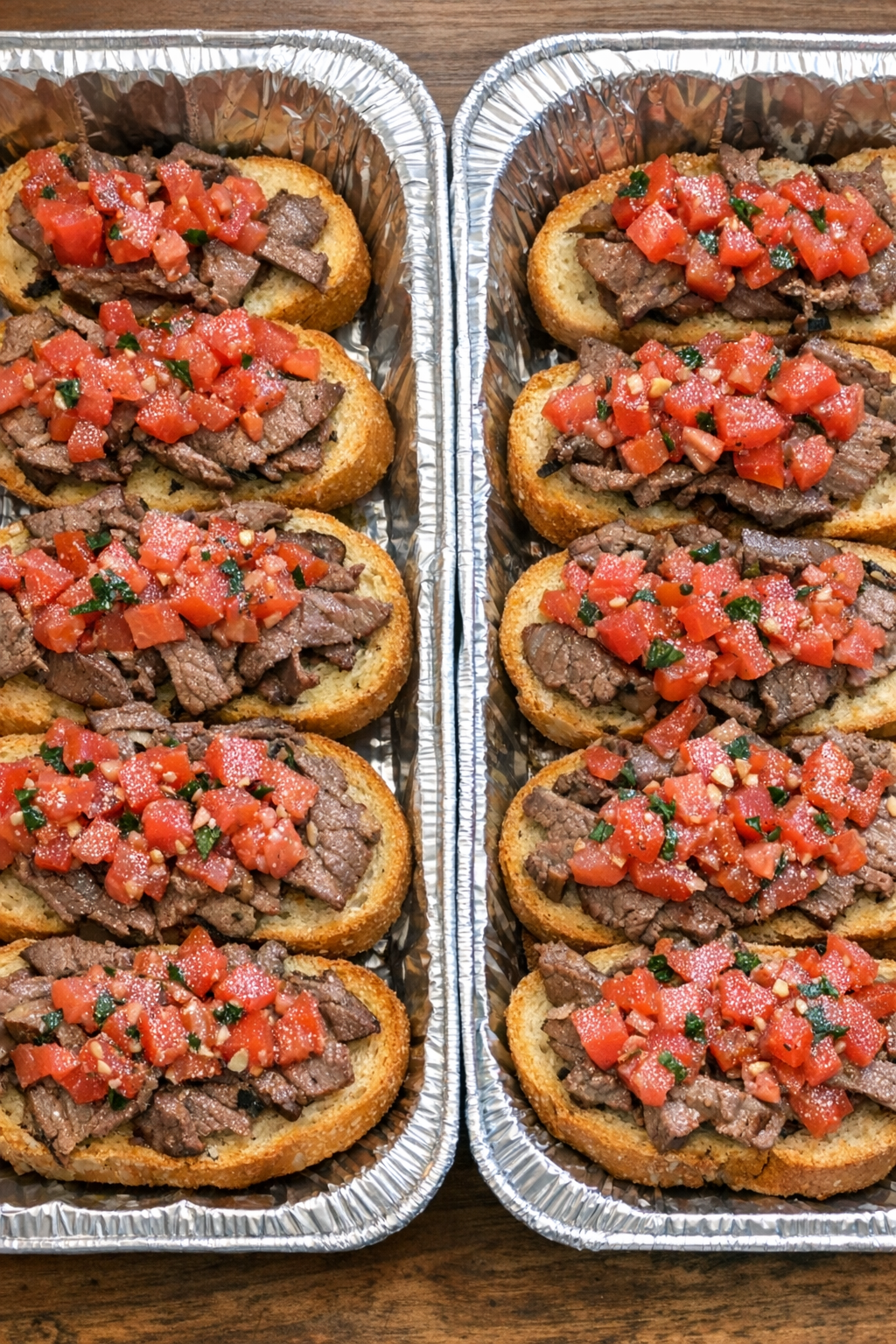 Finished beef bruschetta in foil trays