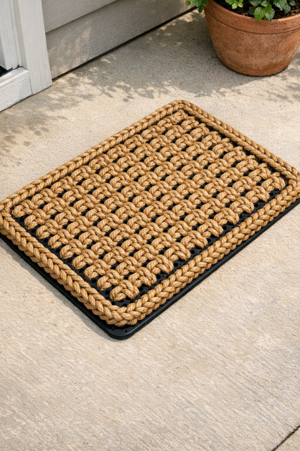 Finished jute and rubber late summer doormat