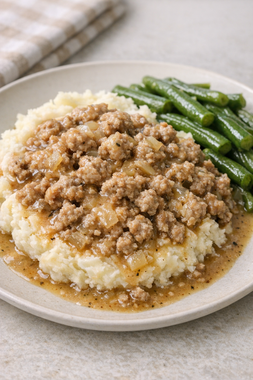 Finished vintage pork supper plated with mashed potatoes