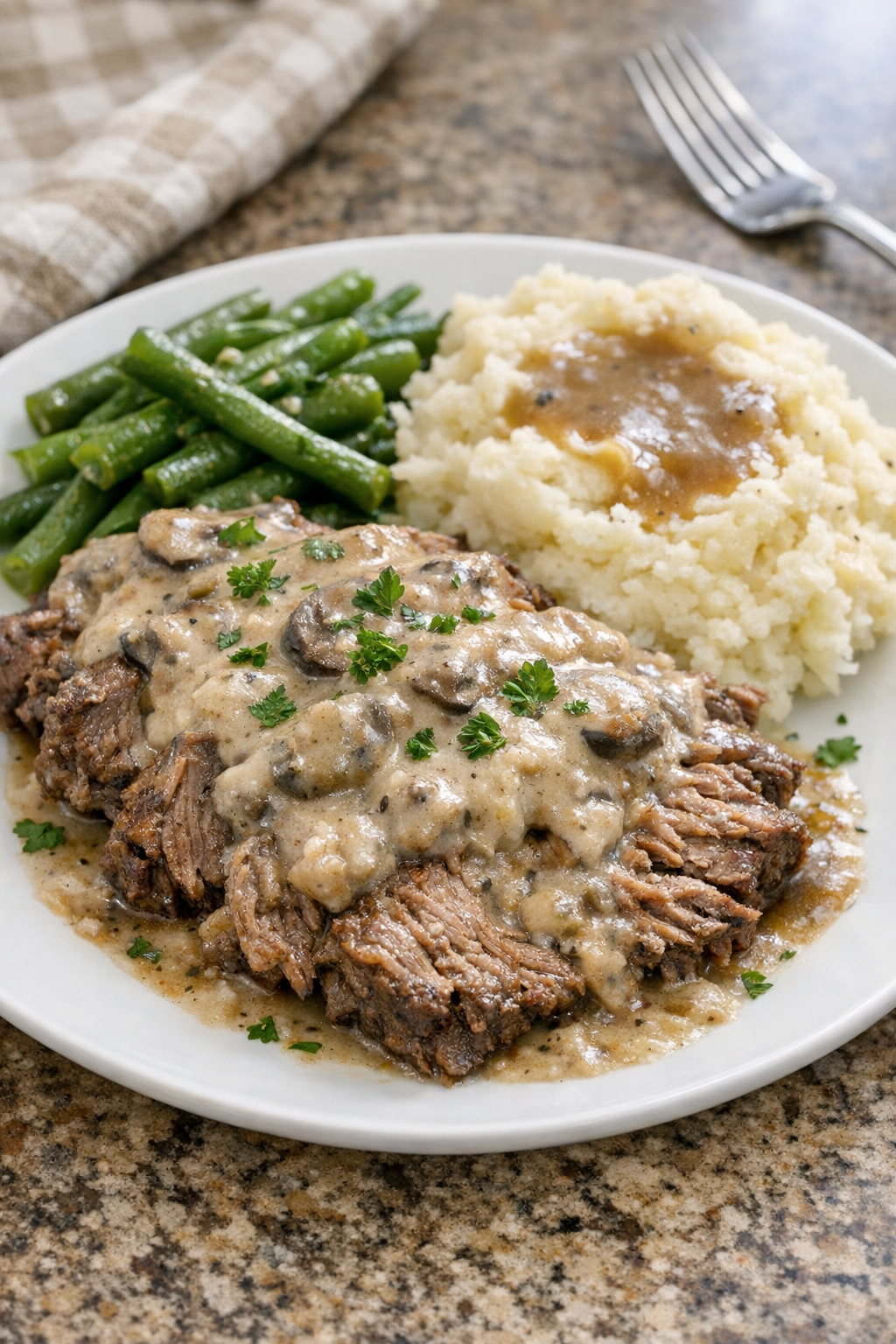 Finished Amish cream of mushroom beef plated with gravy