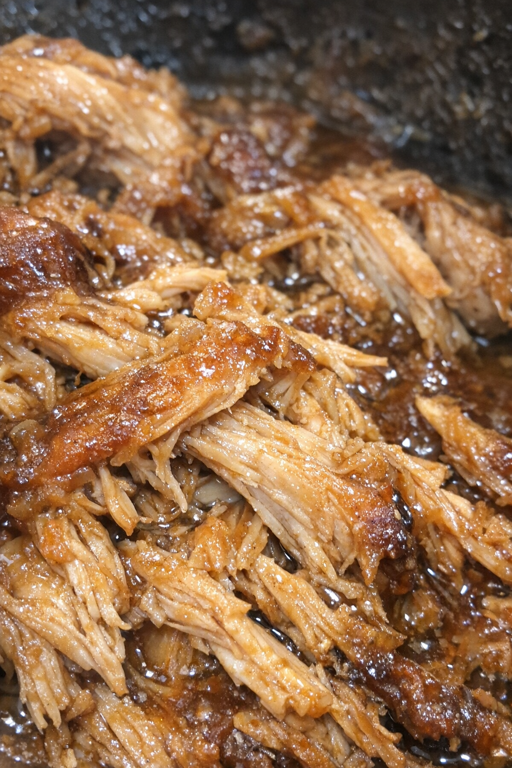 Slow cooker glazed shredded chicken close-up