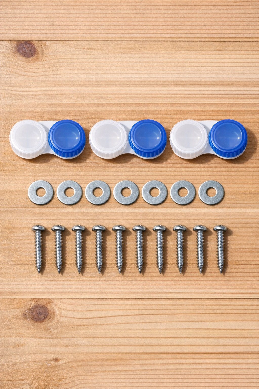 Materials for homemade drawer glides laid out on a work surface
