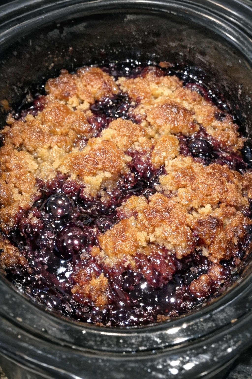 Slow cooker dessert with bubbling amethyst syrup and golden top