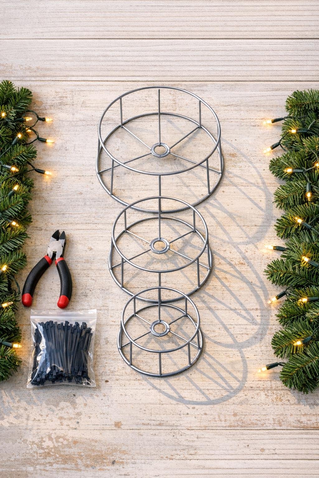 Materials for a lampshade frame holiday project laid out together