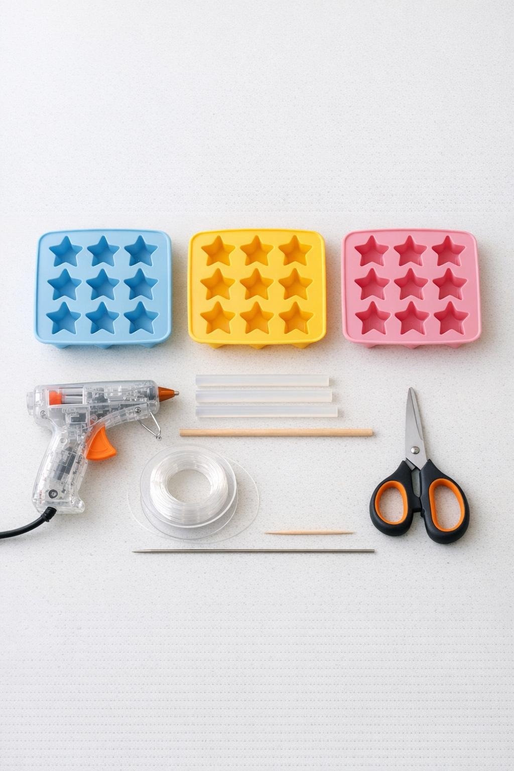 Craft materials laid out for the hot glue star project