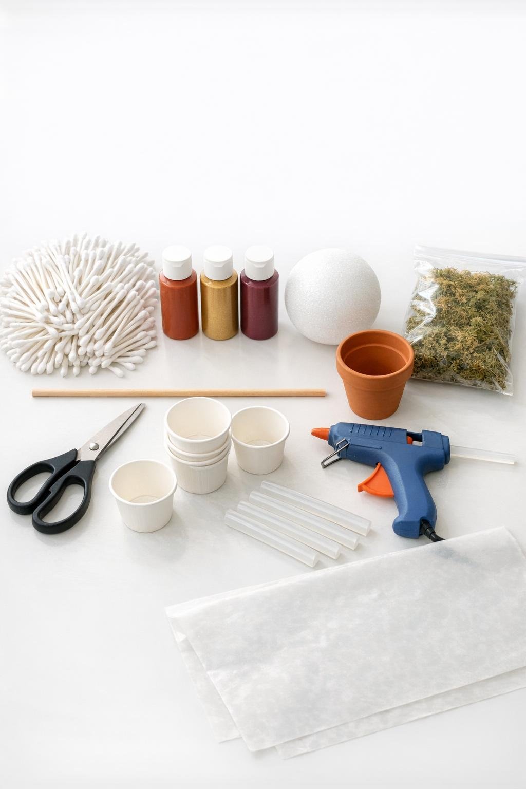 Materials laid out for the cotton swab fall topiary