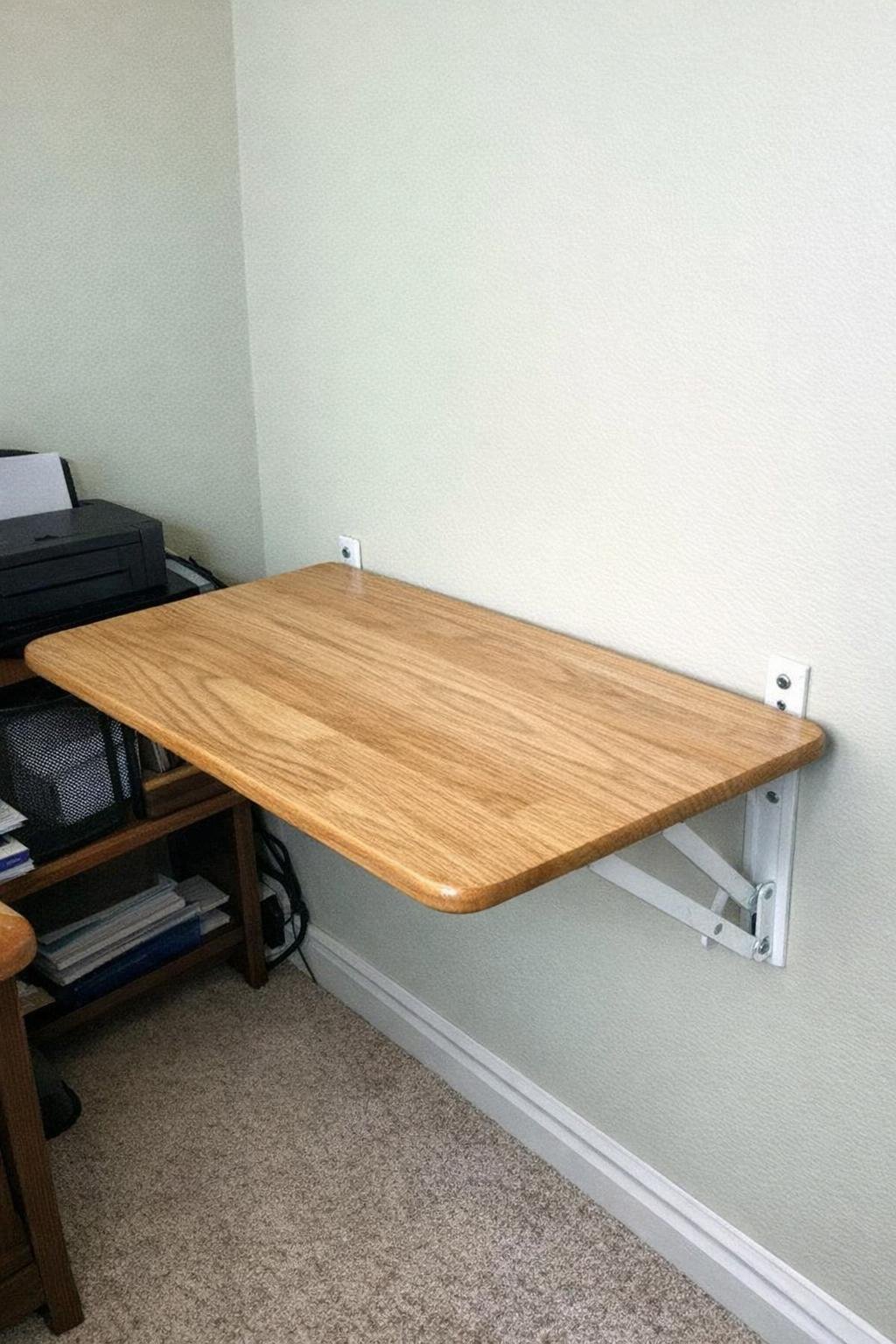 Wall-mounted fold-down desk made from a TV tray top